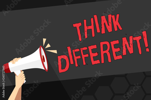 Text sign showing Think Different. Business photo showcasing direct ones mind towards someone or something uniquely Human Hand Holding Tightly a Megaphone with Sound Icon and Blank Text Space