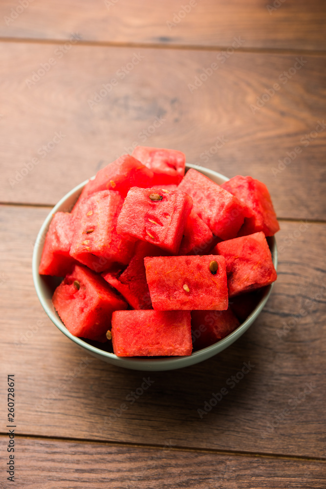 Watermelon / tarbooj fruit cube slices served in a bowl. selective focus Watermelon / tarbooj fruit cube slices served in a bowl. selective focus