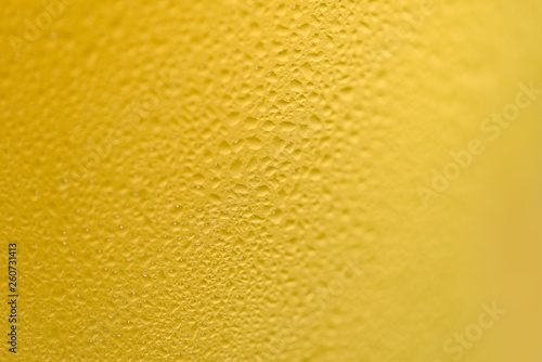 Beer bubbles glass close up of mug beer with water drop on texture background