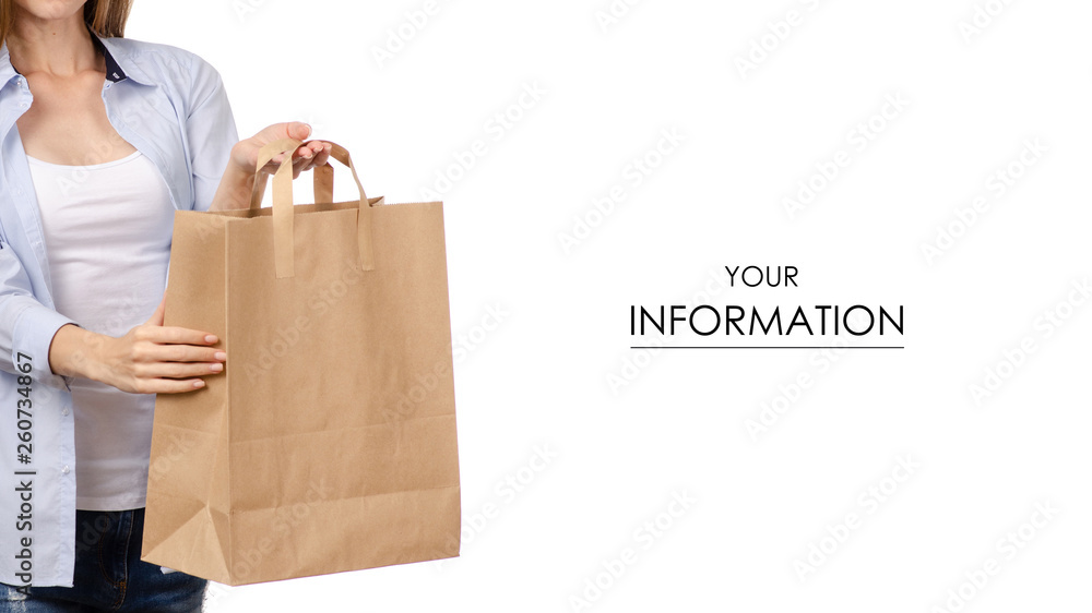Woman holding a paper bag package shopping beauty pattern on a white background. Isolation Woman holding a paper bag package shopping beauty pattern on a white background. Isolation