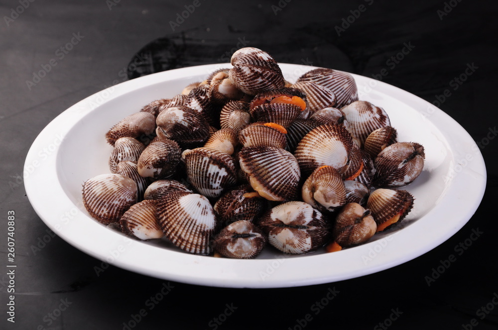 dried figs in a bowl on white background dried figs in a bowl on white background