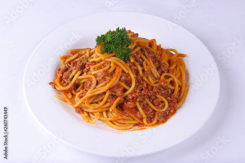 spaghetti with tomato sauce and basil