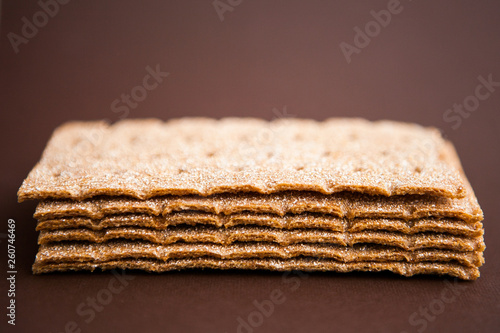 Crisp bread on the dark brown background