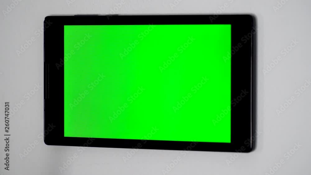 Smart home control device on a wall Smart home control device on a wall
