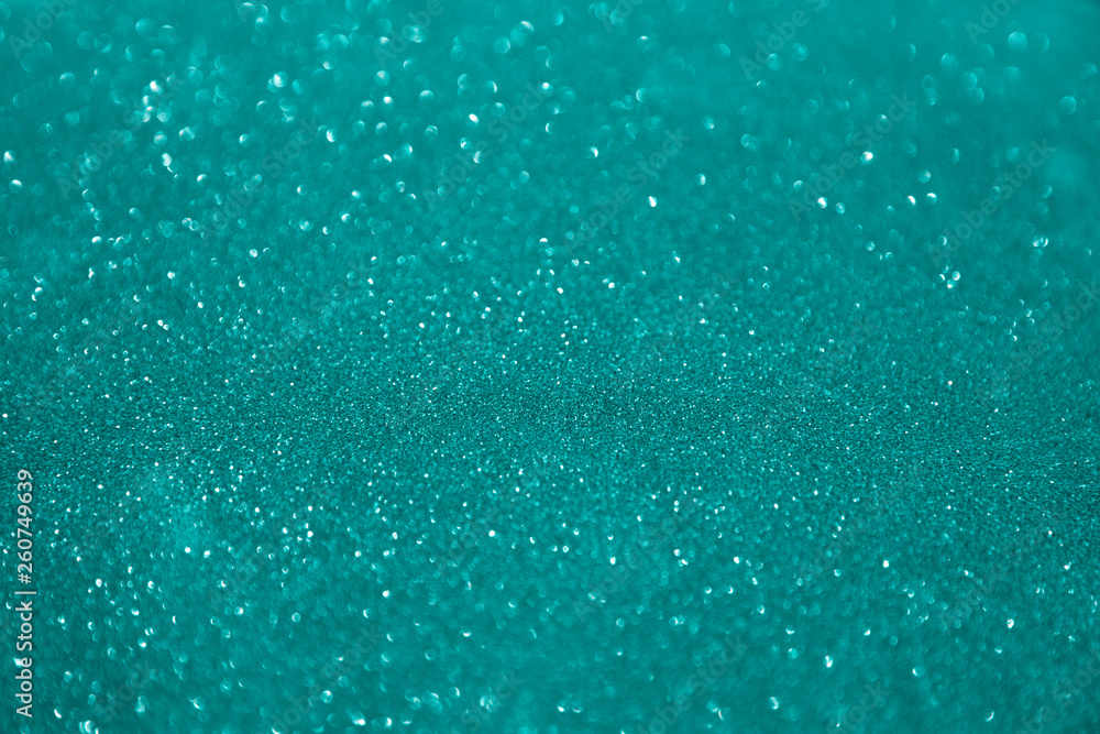 Fototapeta premium blue glittering christmas lights. Blurred abstract holiday background