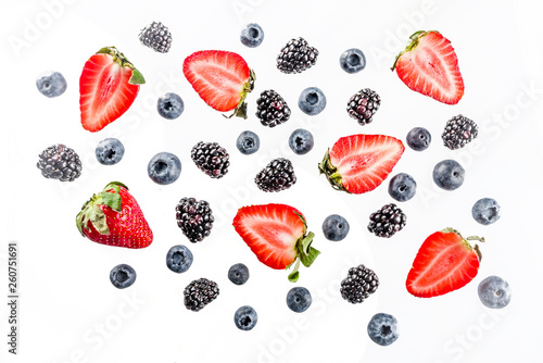 Fresh berries pattern - blueberries  strawberries  blackberries. On white background  top view  flatlay layout