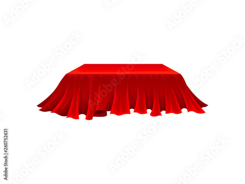 Rectangular box under red cloth on white background.