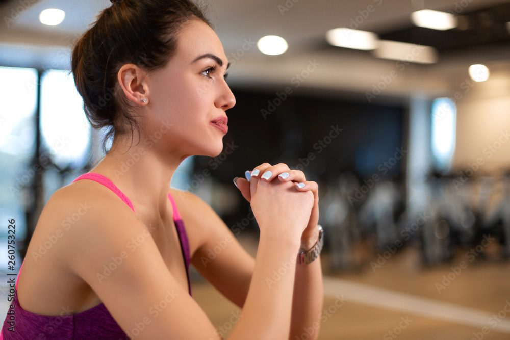 Young woman in sportwear sport exercise in gym. Fitness and wellness lifestyle concept Young woman in sportwear sport exercise in gym. Fitness and wellness lifestyle concept
