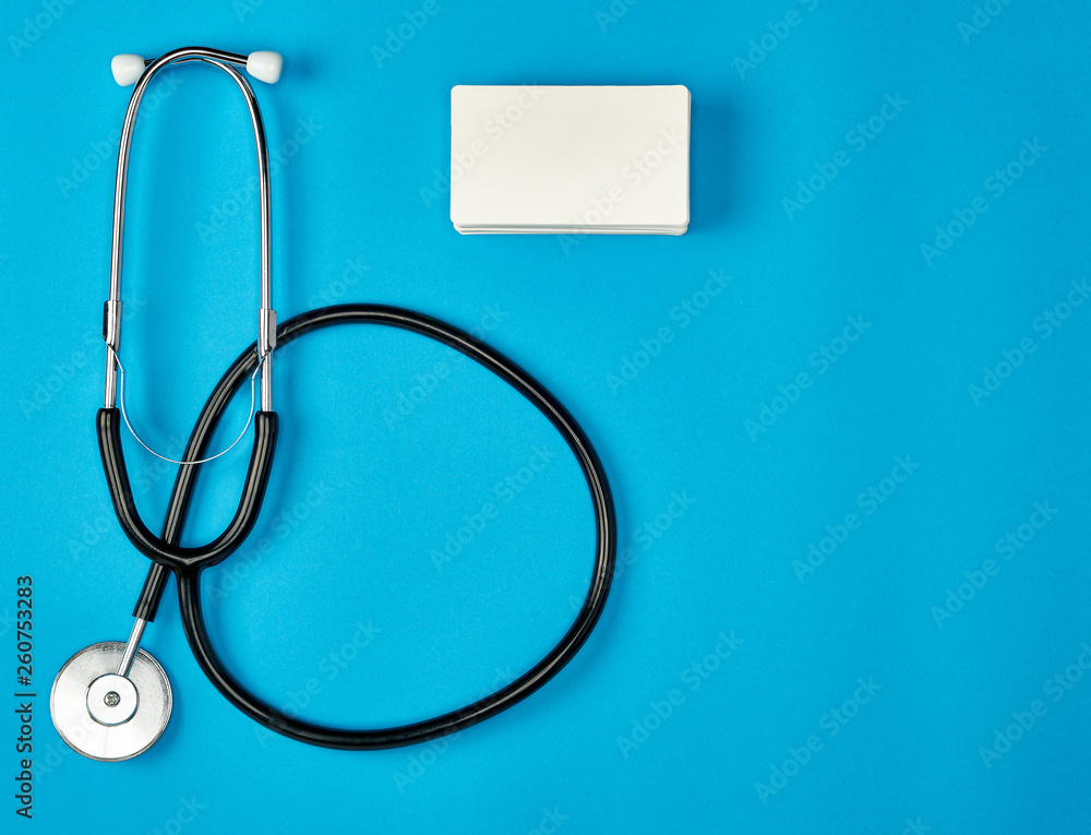 medical stethoscope and empty paper business cards medical stethoscope and empty paper business cards