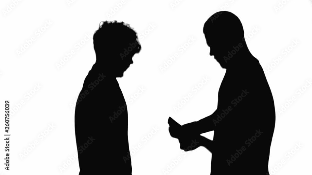 Two silhouettes of concentrated men counting money isolated on white Two silhouettes of concentrated men counting money isolated on white