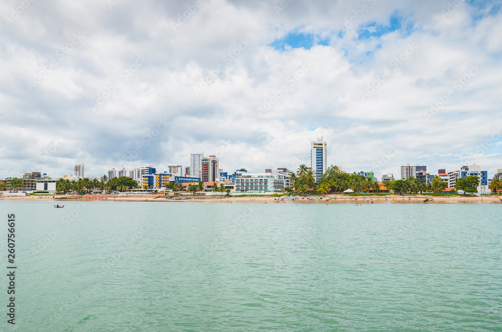 View to the Praia do Bessa beach and the beachfront buildings of the city of Joao Pessoa. Beachfront city.