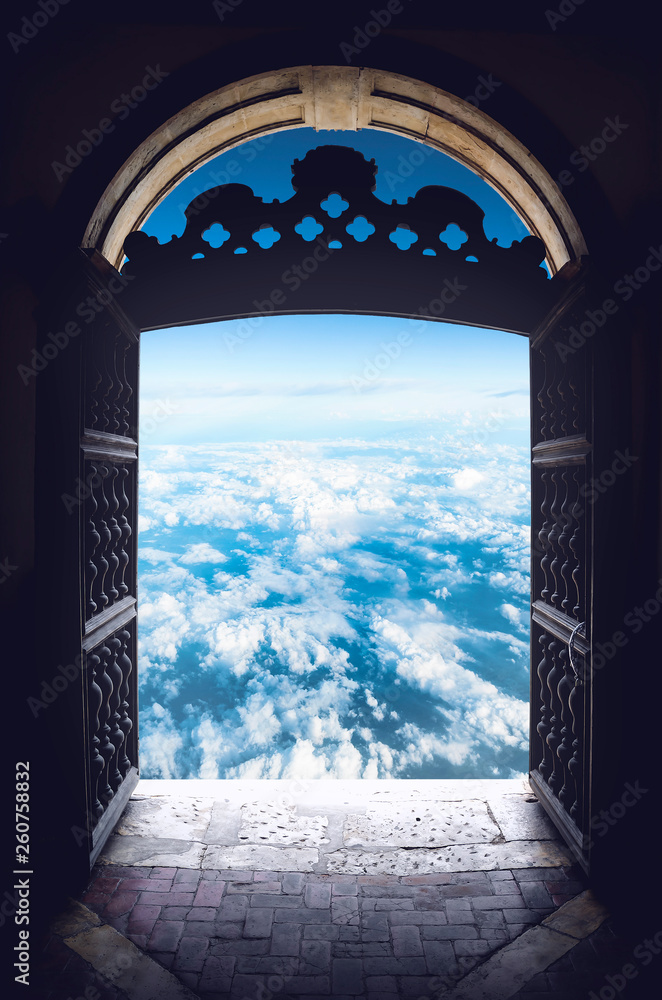 Gates of heaven, acceptance to the sky. Doors open to the sky. Ornamented arched door. 