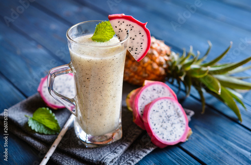 Wallpaper Mural glass of smoothie with fruit and mint on wooden background Torontodigital.ca