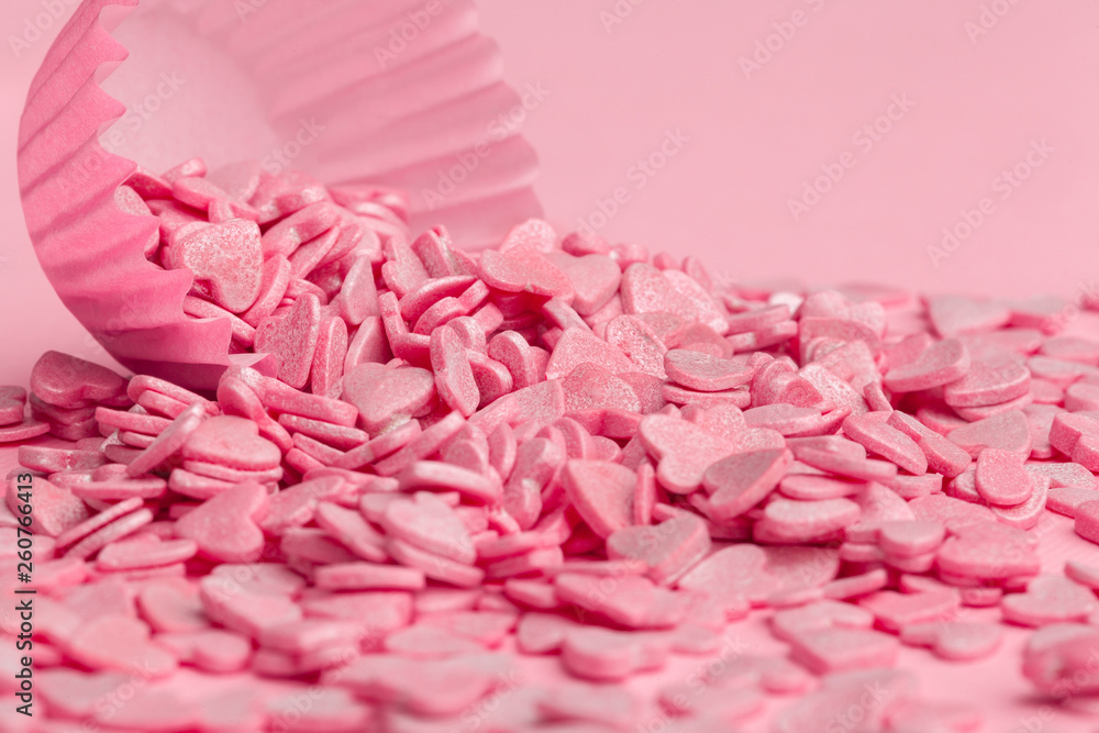 Sugar sprinkles food background on pink cardboard Sugar sprinkles food background on pink cardboard
