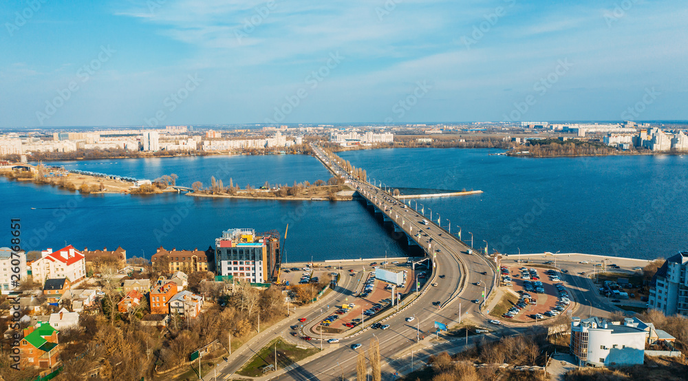 Aerial panorama of Chernavsky bridge and Voronezh river in Voronezh city in sunny spring day
