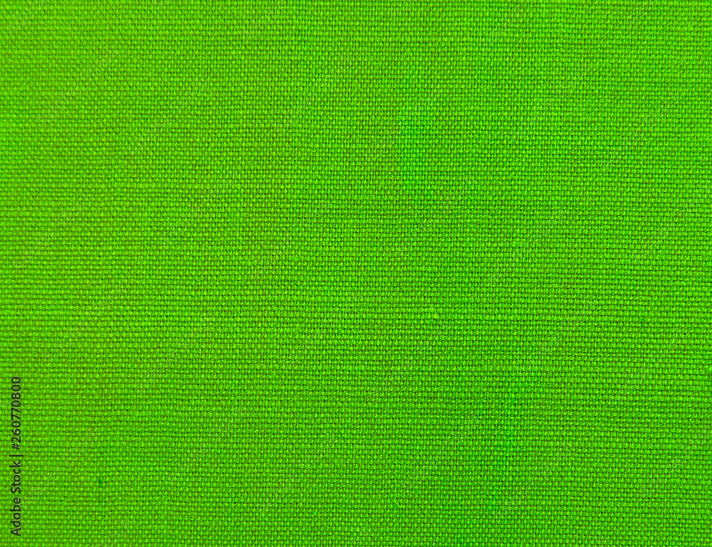 Fototapeta premium Textured background of green natural textile