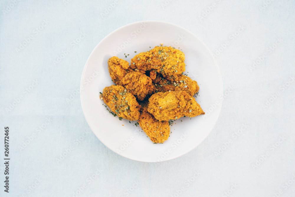 Chicken Wings Spicy chicken wings, breaded, fried, cooked. Chicken Wings Spicy chicken wings, breaded, fried, cooked.