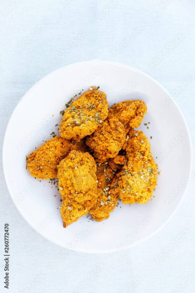 Chicken Wings Spicy chicken wings, breaded, fried, cooked. Chicken Wings Spicy chicken wings, breaded, fried, cooked.