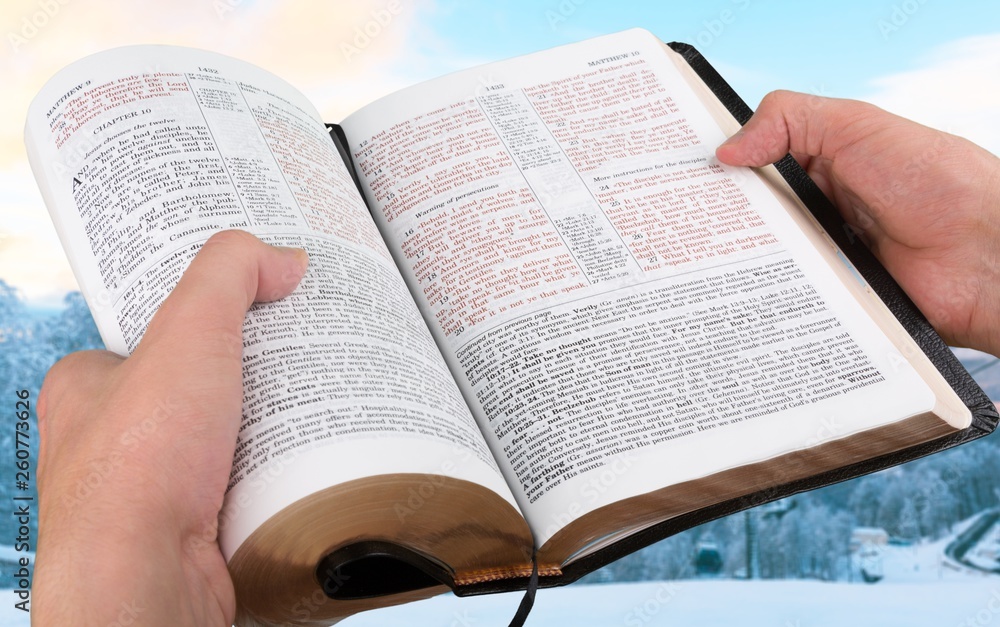 Fototapeta premium Open Holy bible book on background