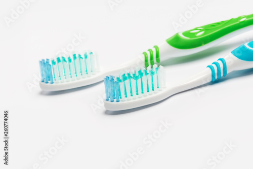 New different toothbrushes on a white background