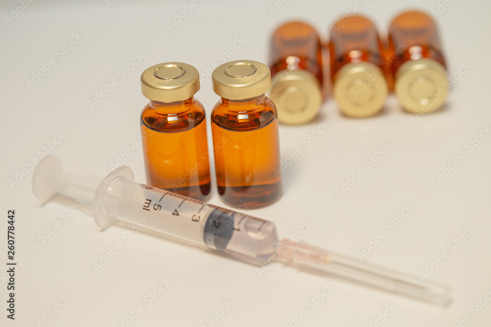 Medicine bottle and syringe Medicine bottle and syringe