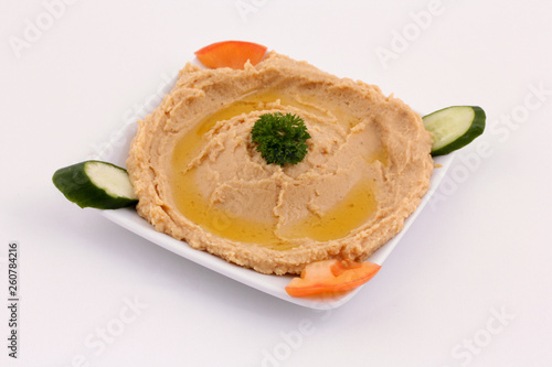 Traditional Arabic Hummus in White Bowl - Creamy Middle Eastern Dip, Studio Food Photography on white background