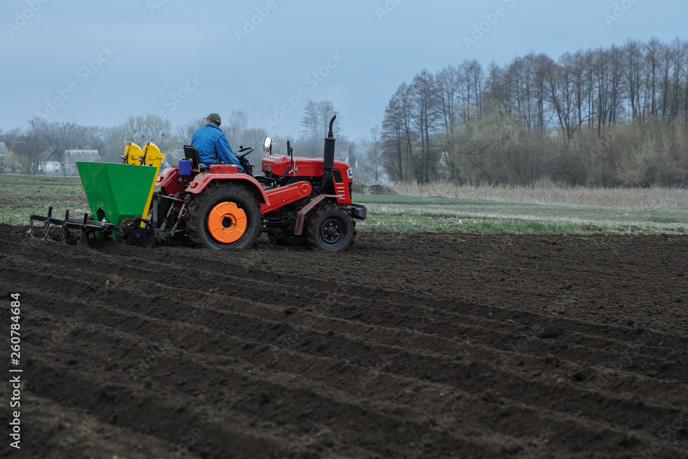the tractor is developing the ground the tractor is developing the ground