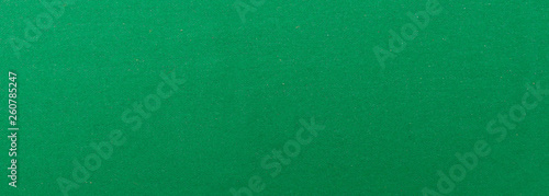 Green felt textile texture background, banner, closeup view