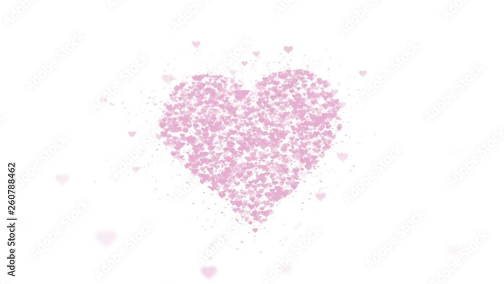 Blurred pink heart is isolated on white background. Accumulation of little hearts creates one large heart. Close up. Copy space. Blurred pink heart is isolated on white background. Accumulation of little hearts creates one large heart. Close up. Copy space.