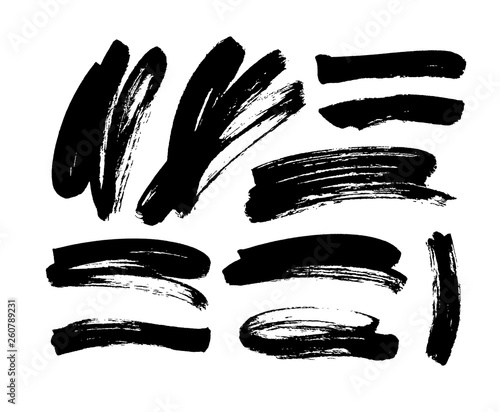 Black dry brushstrokes hand drawn set. Vector grunge lines smears collection.