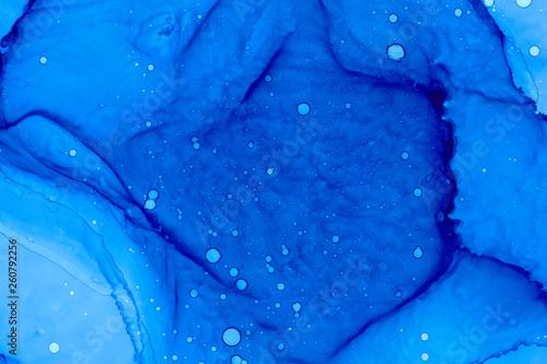 Blue watercolor wallpaper background. Indigo ultramarine alcohol ink art.