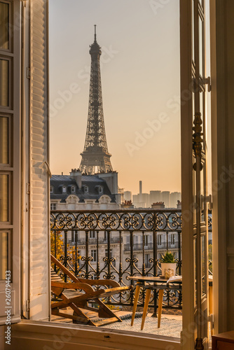 Leinwand Poster beautiful paris balcony at sunset with eiffel tower view