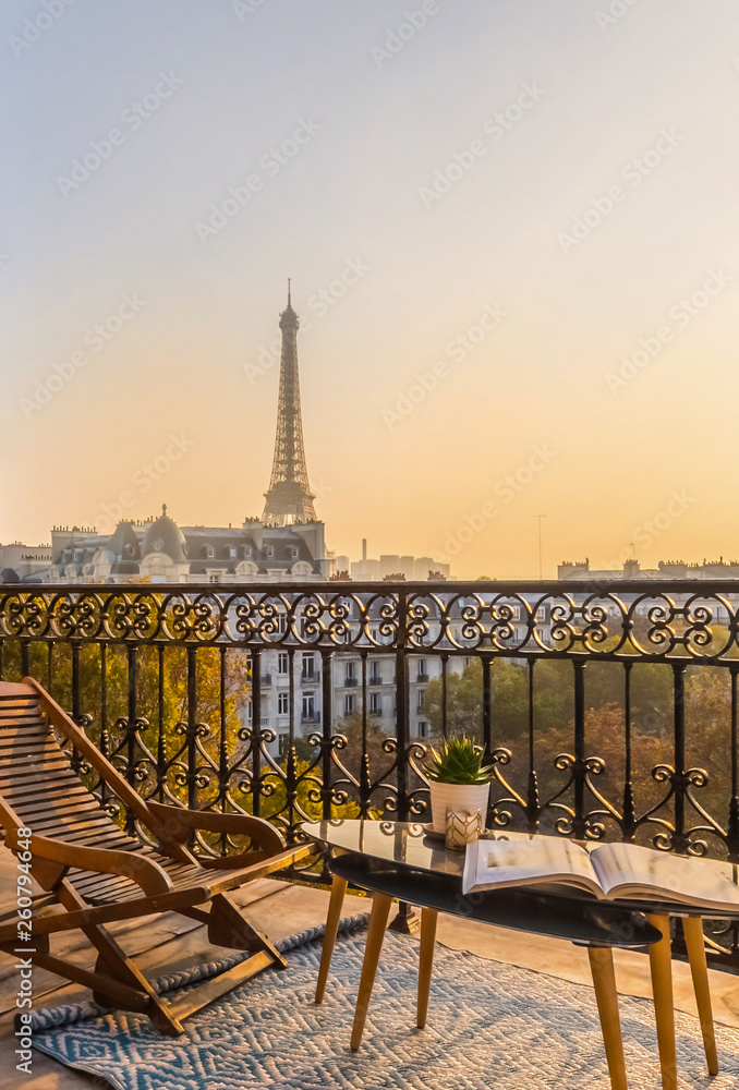 beautiful paris balcony at sunset with eiffel tower view