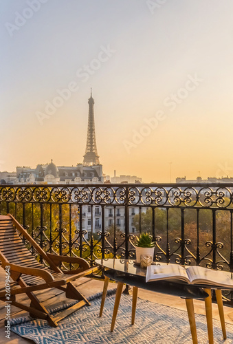 beautiful paris balcony at sunset with eiffel tower view  © Karen Mandau