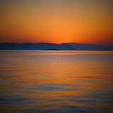 Sunset above a beach on Skopelos Island, Greece