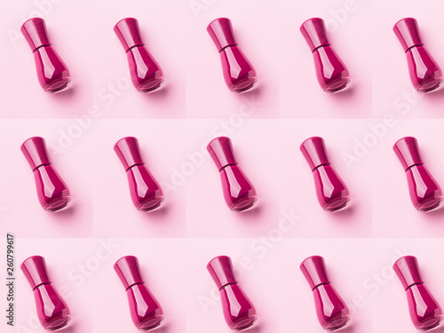 Dark pink nail polish bottle pattern on monochrome