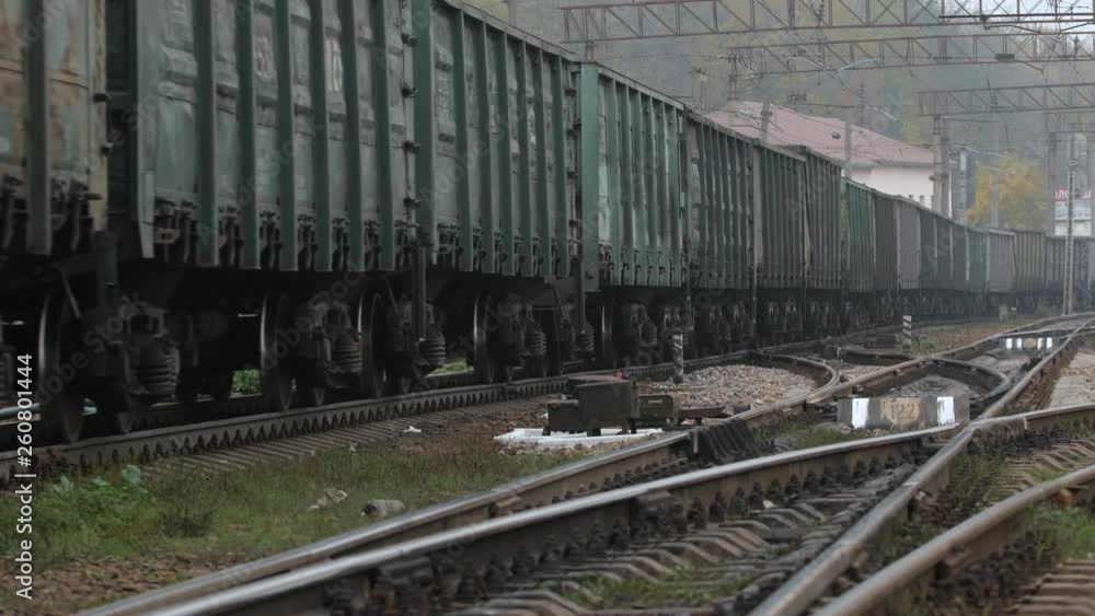 Freight train cars are traveling Freight train cars are traveling