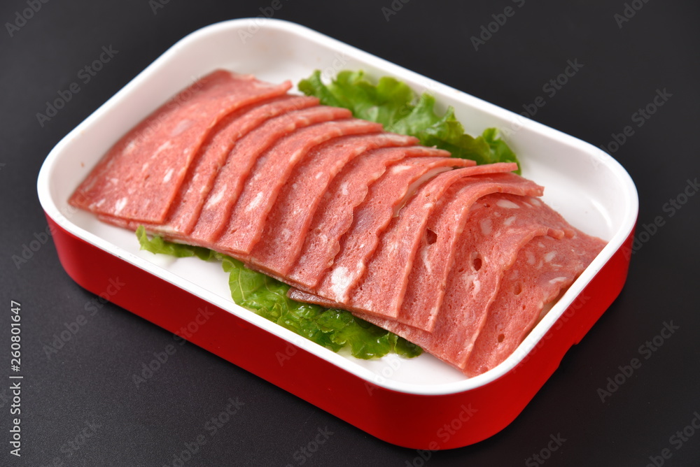 slices of ham on white plate