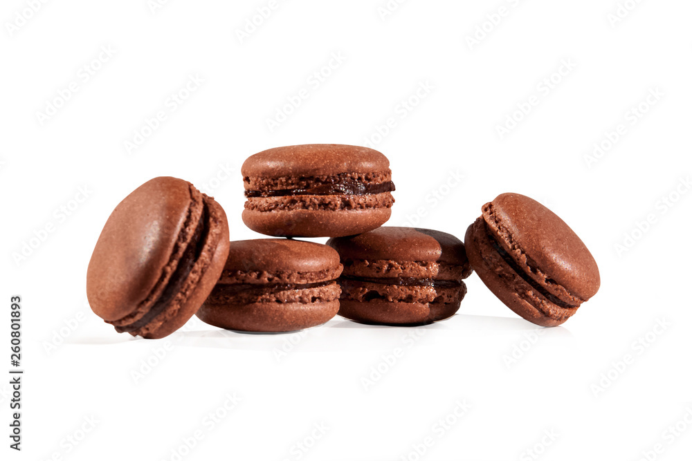 Sweet chocolate homemade macarons isolated on white background Sweet chocolate homemade macarons isolated on white background