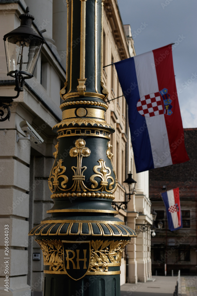 Detail of lamppost  with Croatian flag in the background