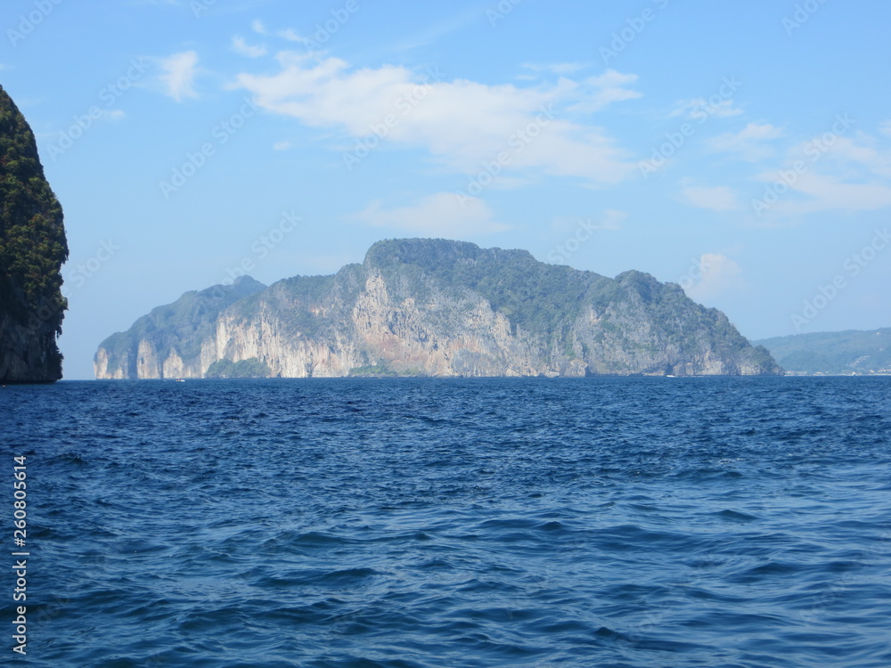 Sea and island on the horizon Sea and island on the horizon