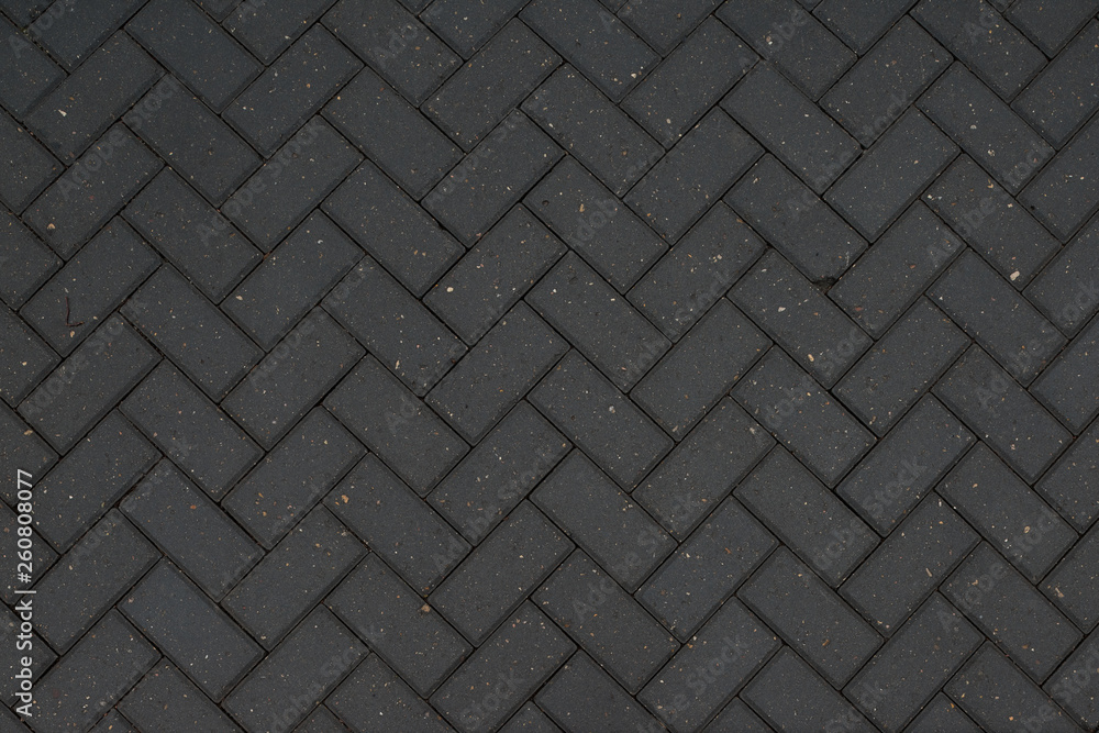 Texture of road tiles with herringbone pattern Texture of road tiles with herringbone pattern