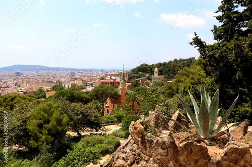 Aerial view of Barcelona from Park Güell with The Gaudi House Museum in the foreground.