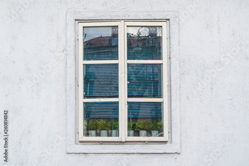 white window on gray wall © phpetrunina14