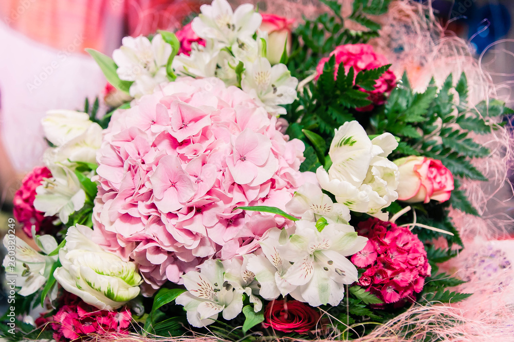 bouquet of tender and bright pink and white flowers with green leaves bouquet of tender and bright pink and white flowers with green leaves