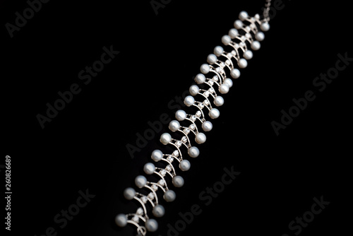 pearl necklace on black