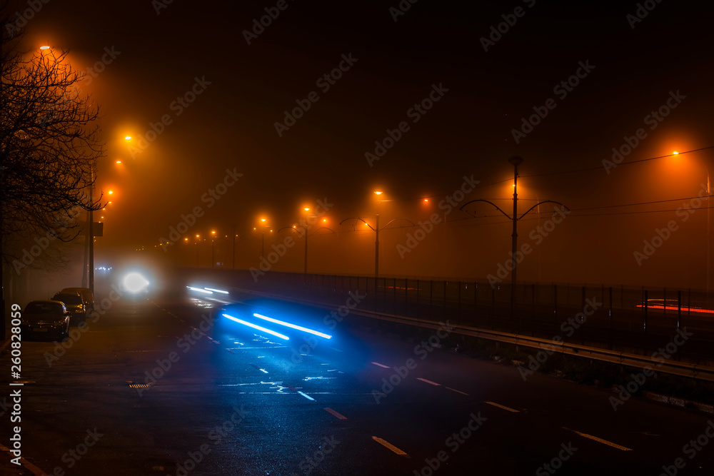 A night city in a dense fog