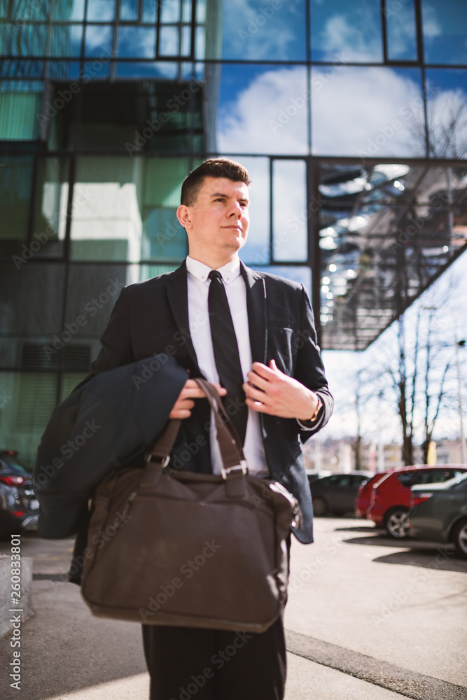 Businessman going home after long working day Businessman going home after long working day