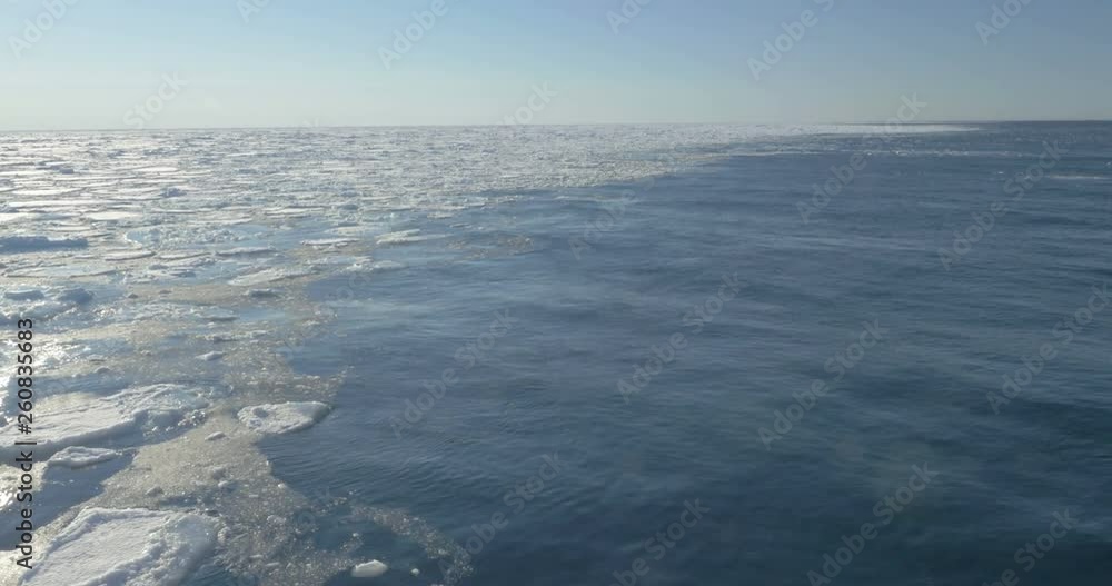 Ice on the sea of Spitsbergen Beautiful shot of ice floating on the blue sea in Spitsbergen in 4K resolution Ice on the sea of Spitsbergen Beautiful shot of ice floating on the blue sea in Spitsbergen in 4K resolution
