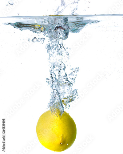 Lemon falling in water